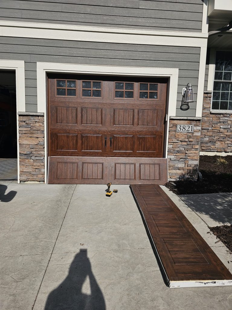 New garage door installation in progress in Minnesota - David's Urgent Garage Door Service