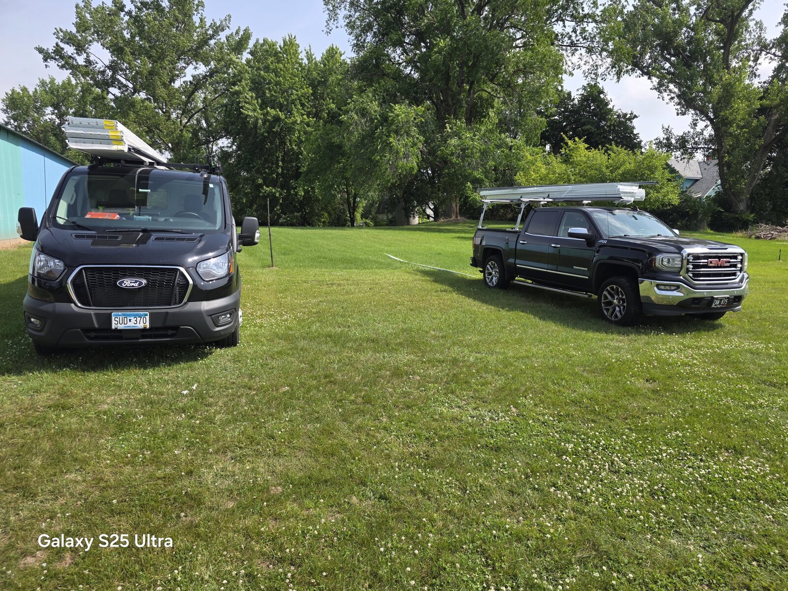 David's Urgent Garage Door work vehicles, stocked and ready