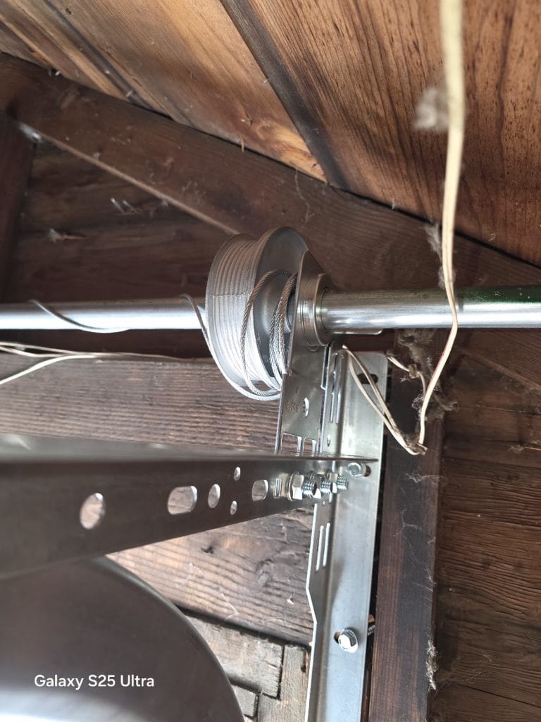 New cable drum, end bearing plate and torsion shaft with the lift cable wound clean