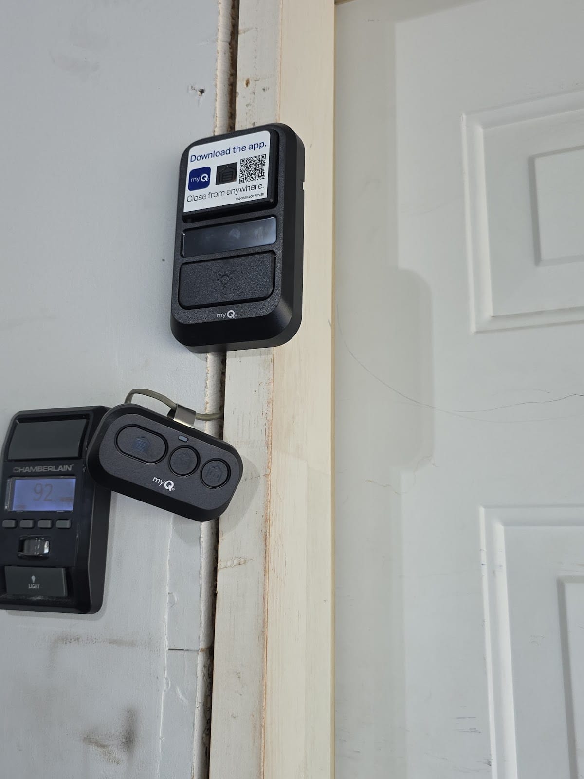 LiftMaster myQ wall console with remote and wireless keypad after opener installation