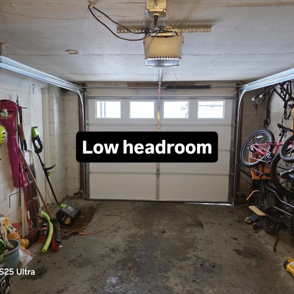 Low-headroom garage door with the opener mounted tight to the ceiling, Minneapolis