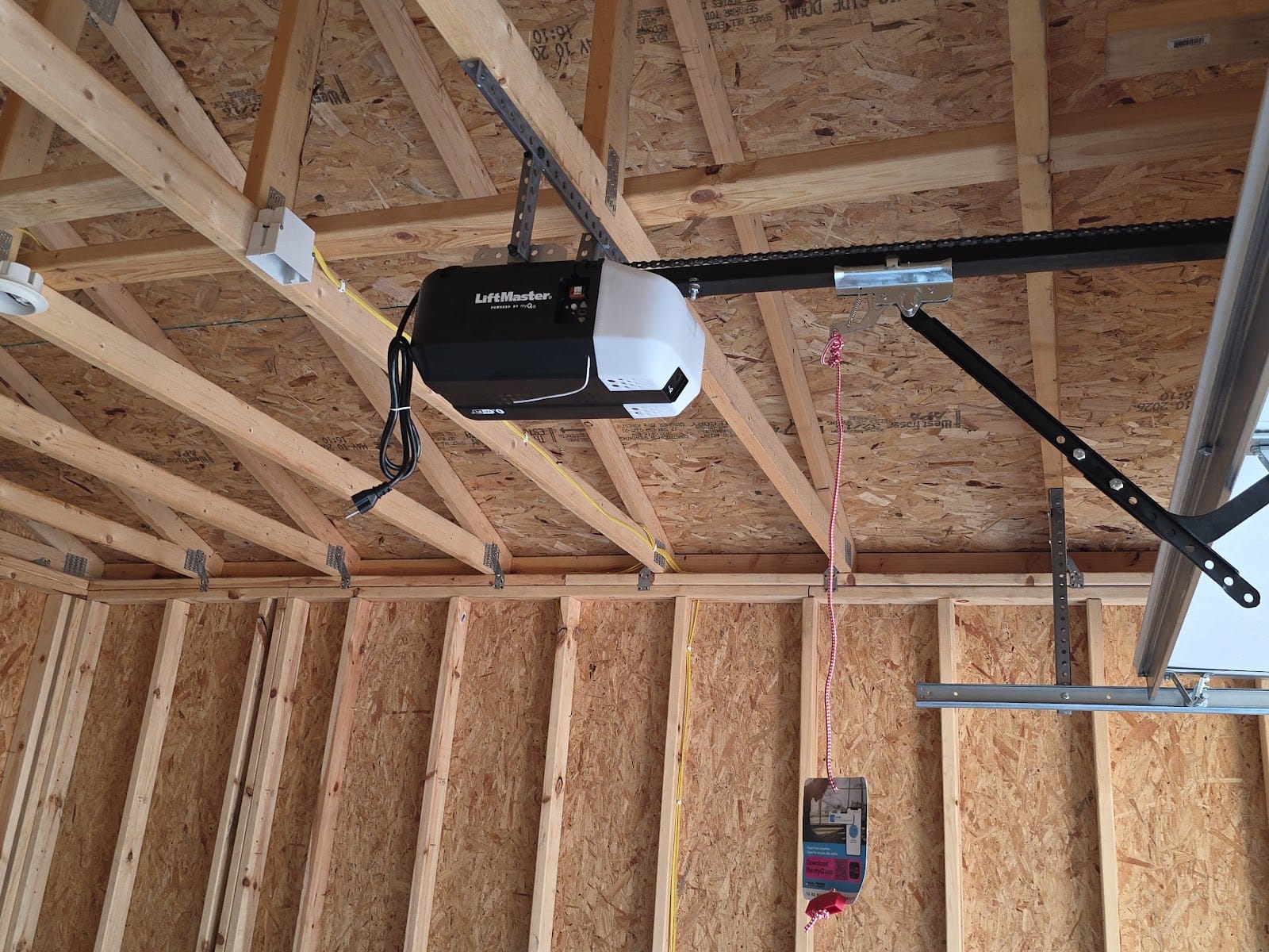 New garage door opener installed in a detached garage in Minnesota
