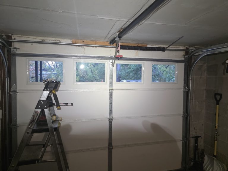 Garage door installation in progress, view from inside the garage, Minnesota