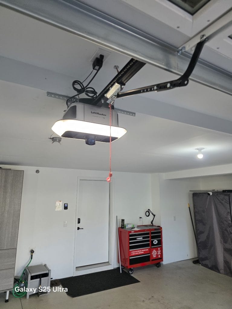 LiftMaster garage door opener with built-in LED light installed in a Twin Cities garage
