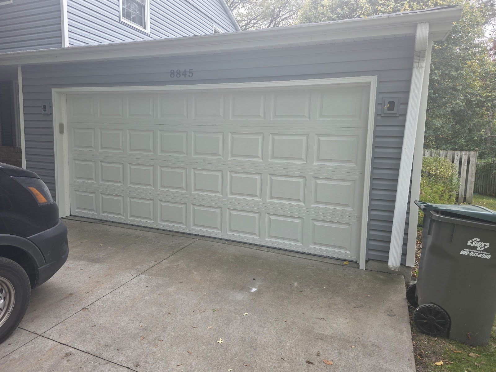 New white 16-foot double garage door installed, Minnesota