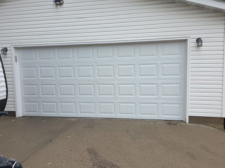 White garage door close-up after replacement, Minnesota